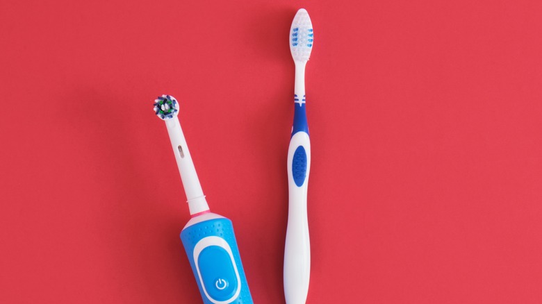 different styles of blue white toothbrushes