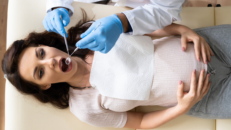 pregnant woman in dentist's chair