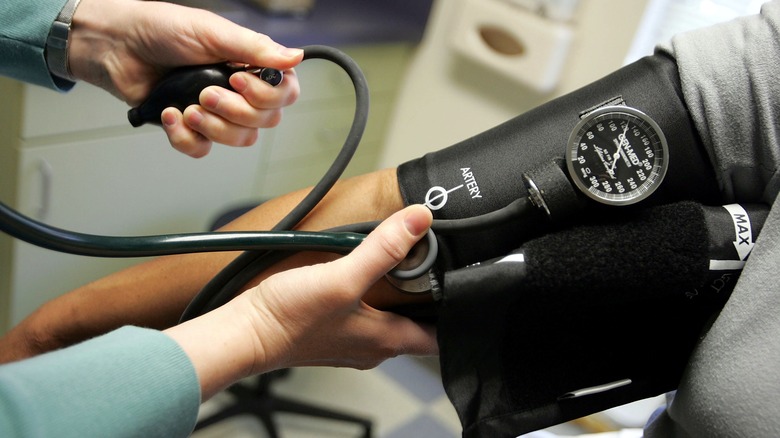 Person getting blood pressure taken