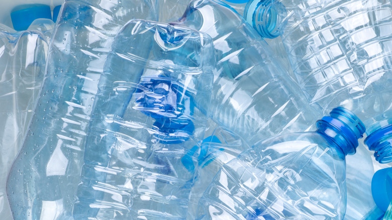 a closeup of empty crushed plastic bottles