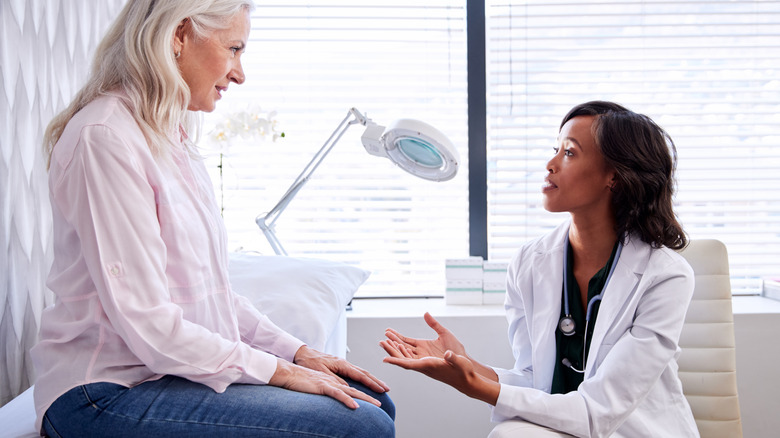 Doctor speaking with female patient