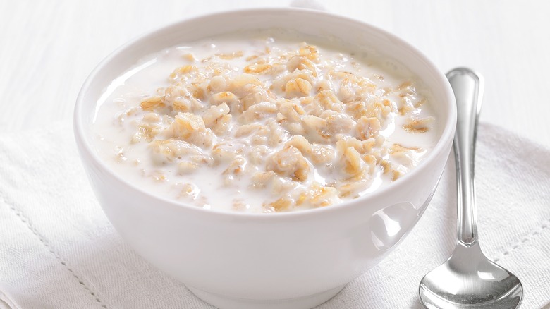 oatmeal and milk in white bowl