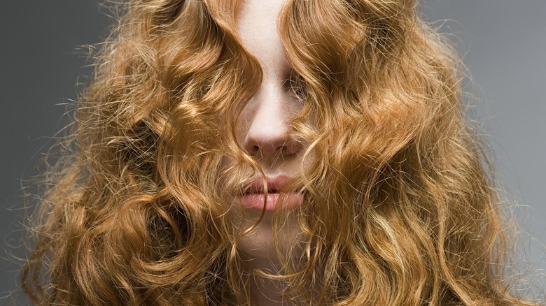 woman with curly red hair