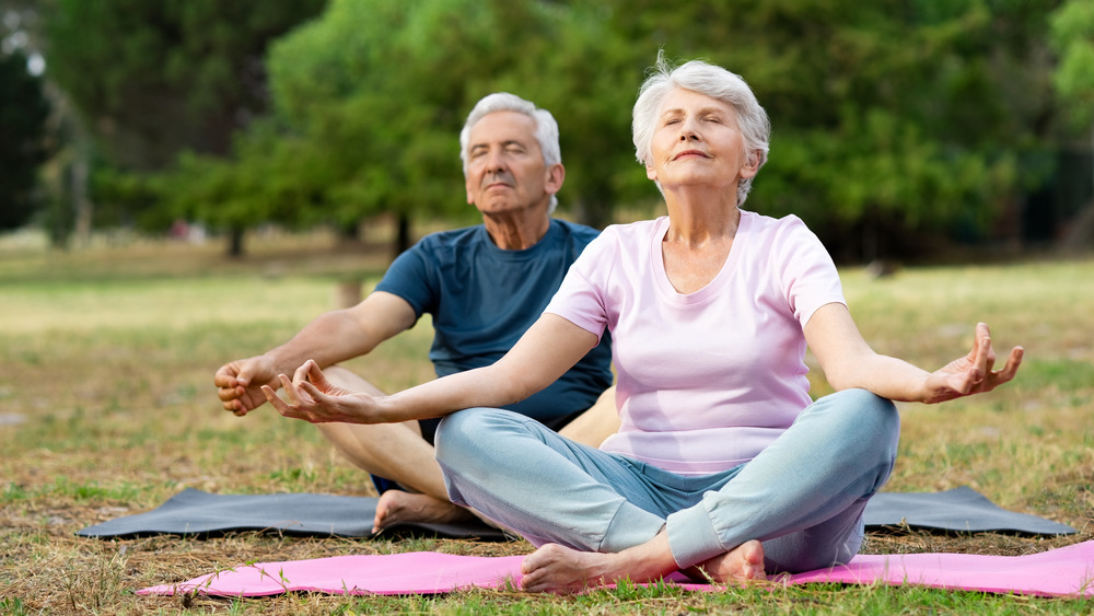 Couple breathing in park