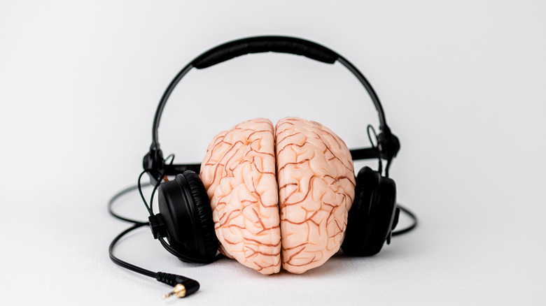 a brain wearing headphones