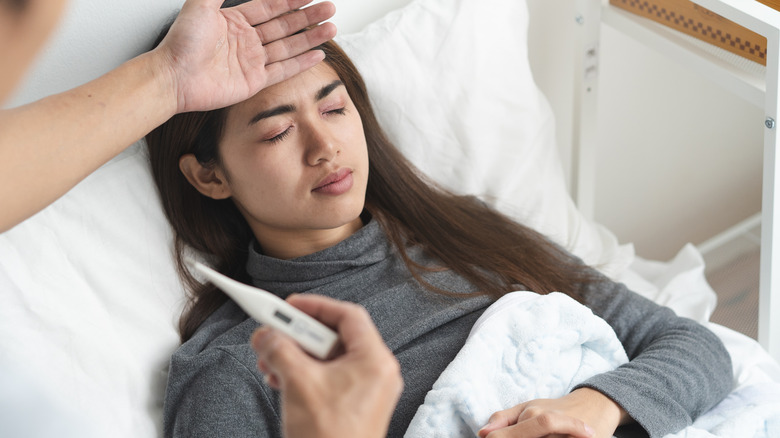 Young woman with fever