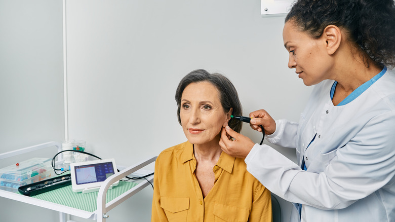 woman getting an ear exam