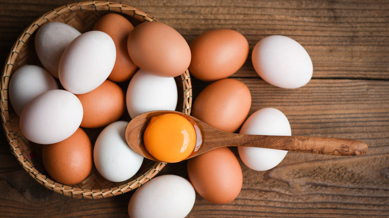 basket of brown and white eggs