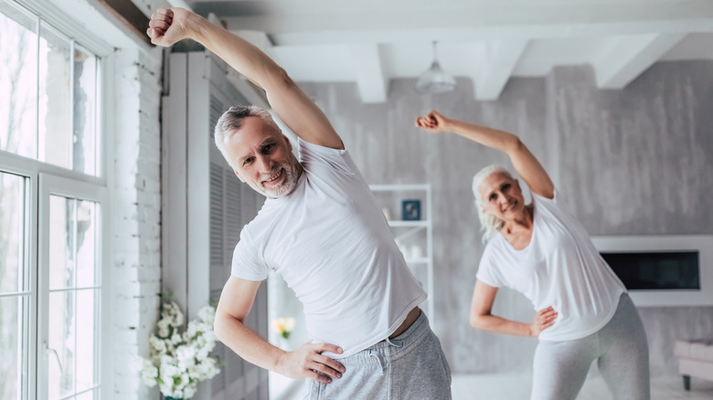 Elderly couple training at home