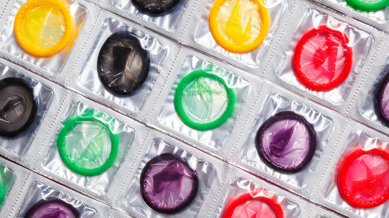 An array of colorful condoms