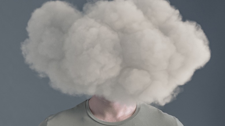 person with clouded brain