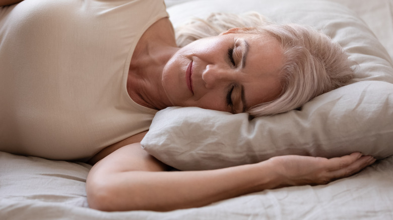 woman resting in bed