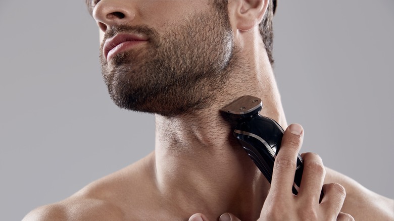 Man shaving beard