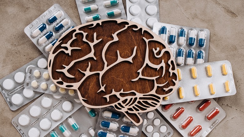 assorted medication under brain cutout