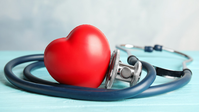 stethoscope and a red plastic heart
