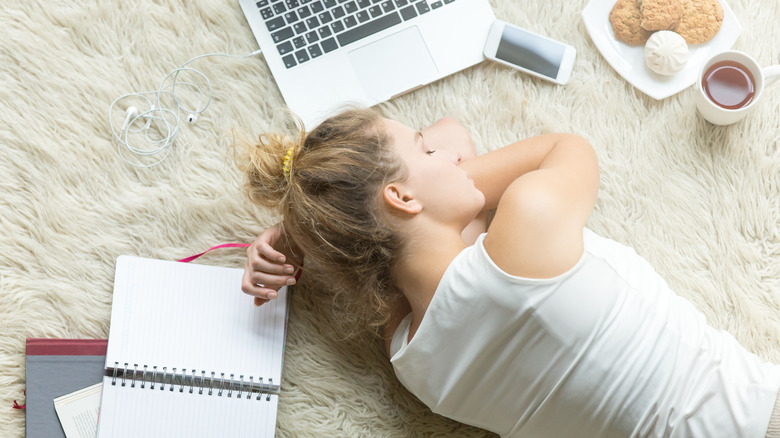 woman sleeping carpet