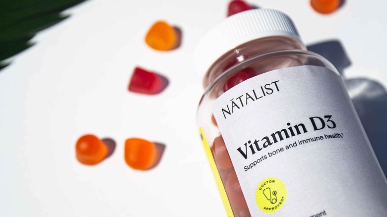 Bottle of Natalist Vitamin D gummies on a white table