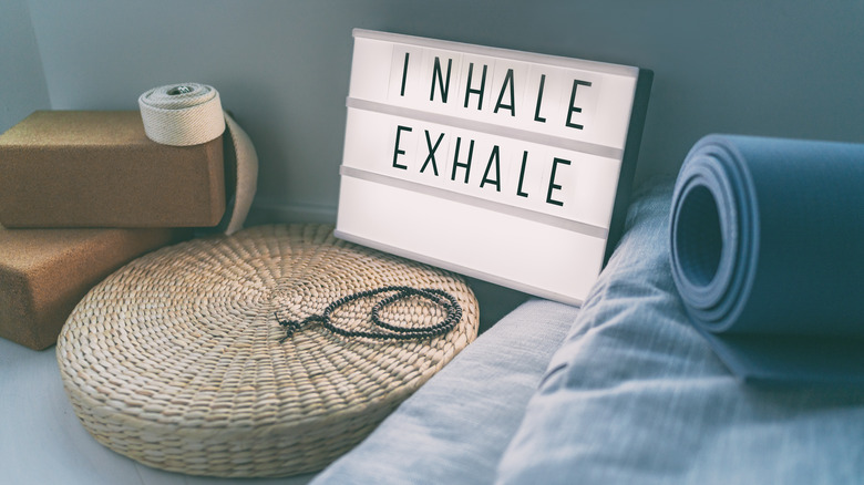 inhale exhale sign in meditation room