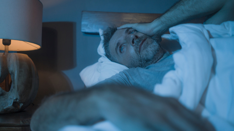 middle-aged man with trouble sleeping