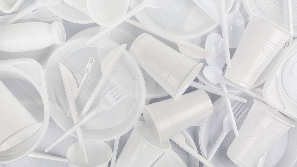 White plastic plates and utensils 