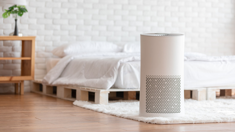 An air purifier in a bedroom