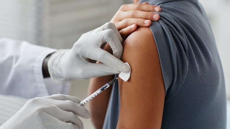 Woman getting vaccinated