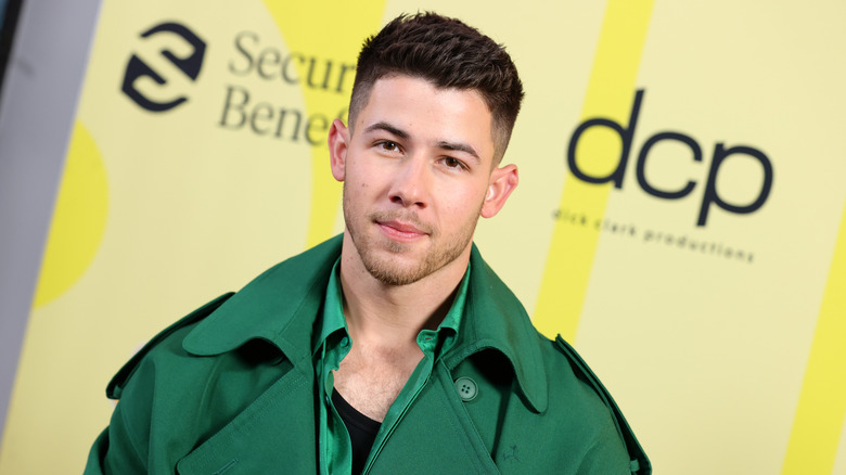 Nick Jonas poses backstage at the Billboard Music Awards