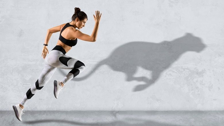 running woman with cheetah shadow