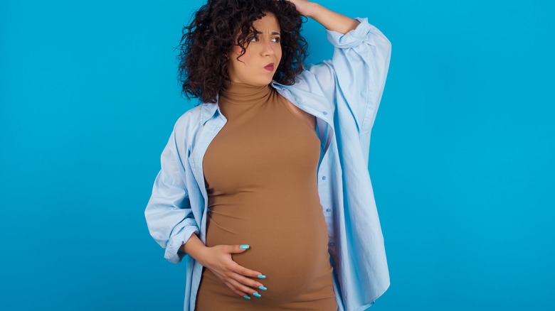 Pregnant woman wondering