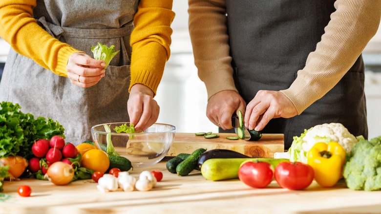 Senior couple preparing a vegetarian meal