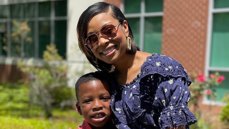 Dr. Kenosha Gleaton smiling with her son