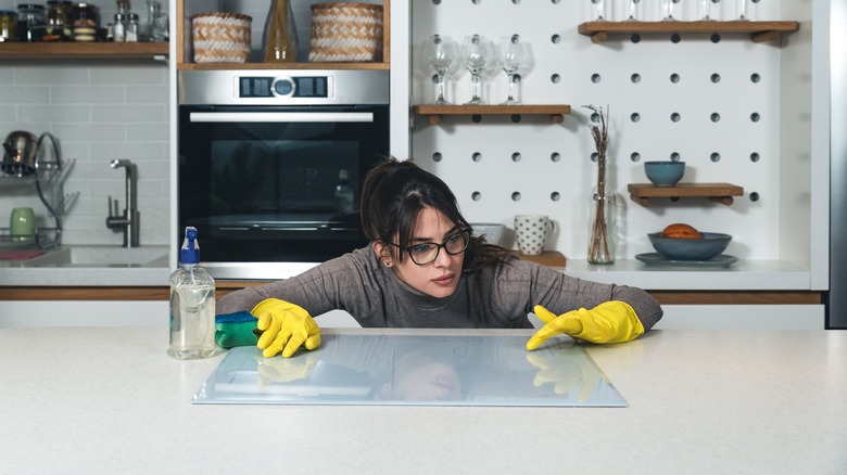 woman compulsively cleaning