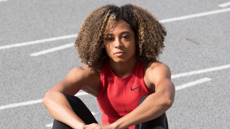 Gabbi Cunningham sits on a track looking serious