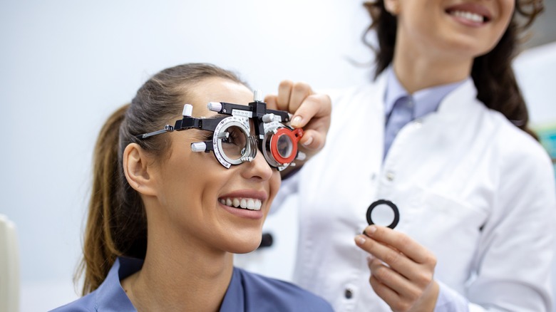 Eye doctor examining patient