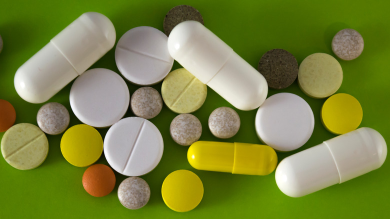 assortment of different capsules and tablets