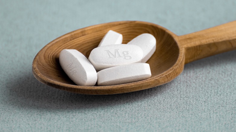 Magnesium supplements in a spoon