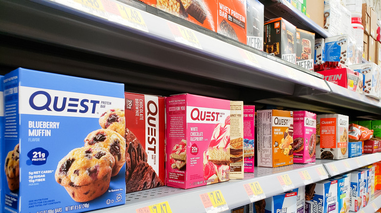 Boxes of protein bars on shelves