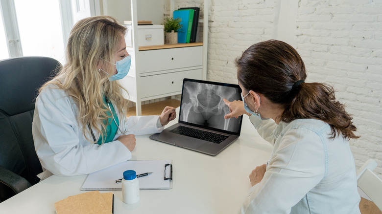 Doctor and patient with X-ray