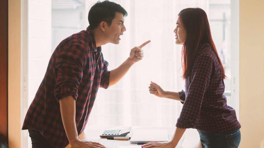 Man yelling at woman