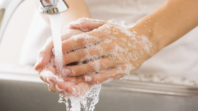 woman washing her hands