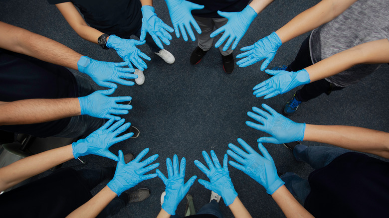 medical team hands symbolizing collaboration