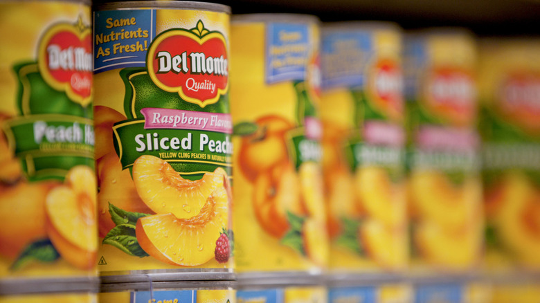row of canned peaches