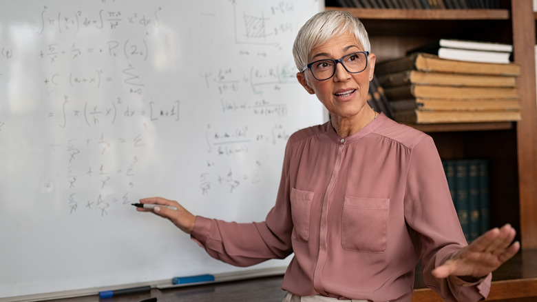 a lecturer using whiteboard