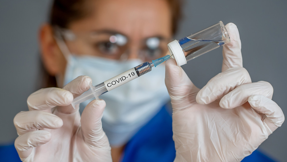 testing covid-19 vaccine in lab