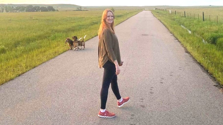 Ree Drummond walking with her dogs at her ranch in Oklahoma