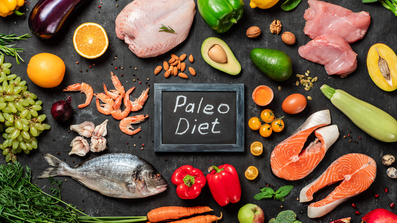 Paleo diet foods arranged on surface