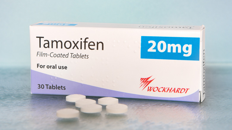 Box of tamoxifen behind individual tablets