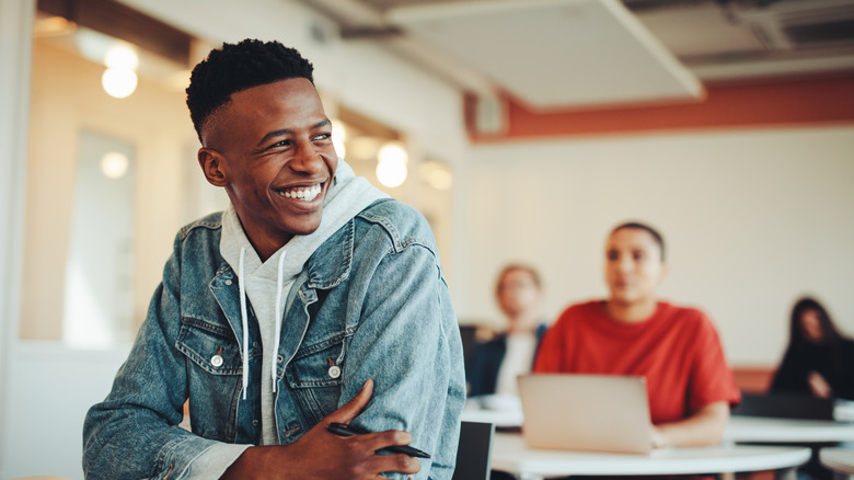 Young man paying attention in class