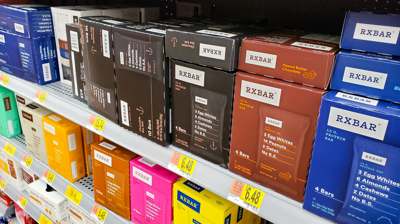 Boxes of RX Bars on grocery store shelf 