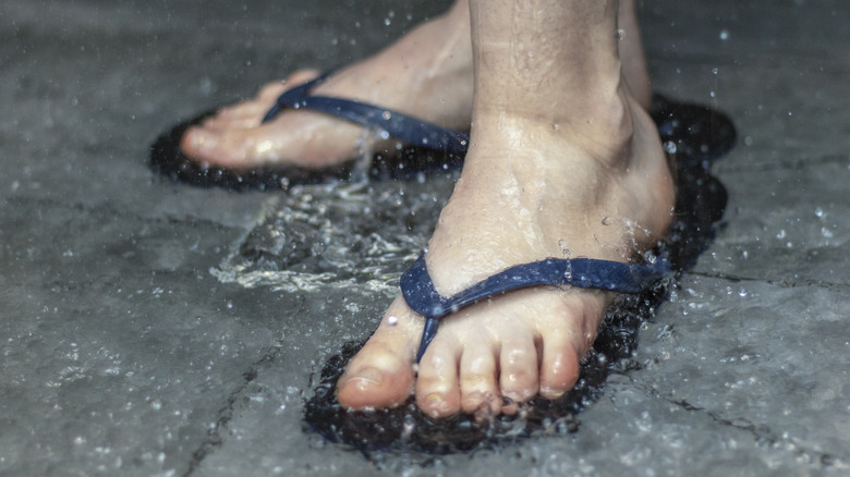 Wearing flip flops in shower